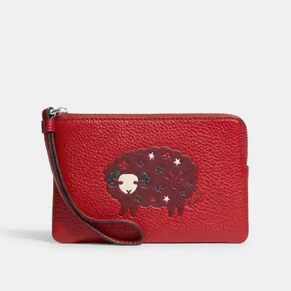 Coach Handbags - Coach Red Leather Wristlet with Aries NWOT